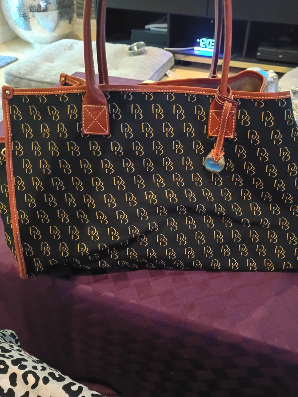 Beautiful Dooney & Bourke Black Logo Tote with Brown Leather Trim
